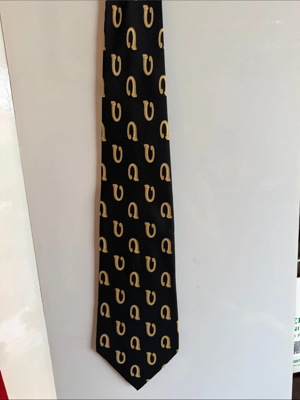 Gucci Black Silk Tie with Gold Horseshoe Motif